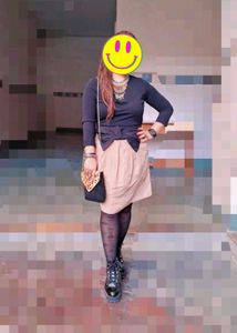 Attached Skirt And Top With A Bow.