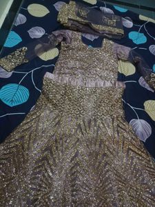 lehenga with small pipes like beads.