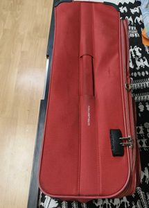 American Tourister Red DC Superlight Trolley Bag