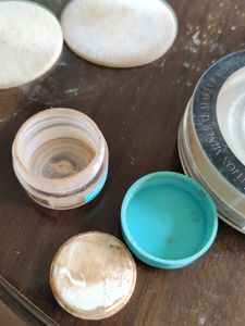Empty Bottles And Compact Puffs For Re-use