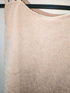 Elegant Beige Pom-Pom Top