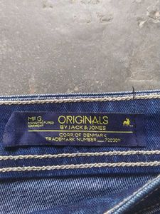 Ripped Blue Denim Jeans