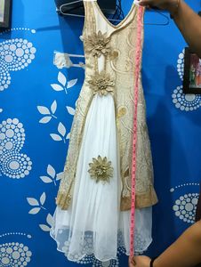 Beautiful white dress with golden flower work