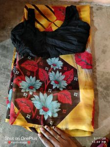 Saree With Sleeveless Blouse