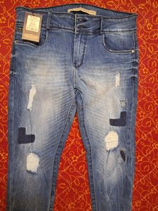 Women&#39;s Blue Rigged/Distressed Jeans