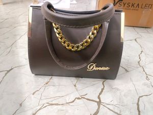 Handbag With Sling Belt