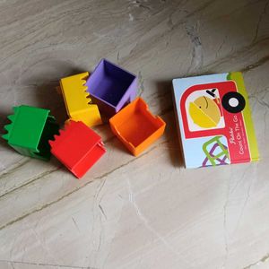 Stacking toys and a puzzle book