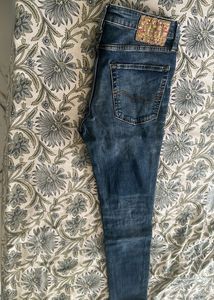 Distressed Denim Jeans