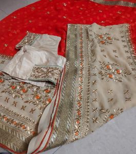 Embroidered net saree with blouse