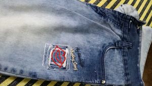 Distressed Light Wash Denim Jeans