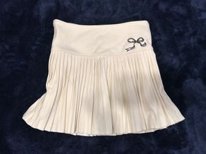 Pleated Mini Skirt with Bow Detail
