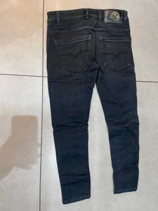 Ripped Black Denim Jeans