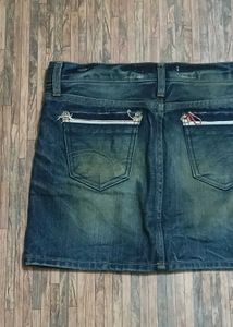 Dark wash denim mini skirt