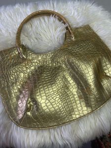 Luxury gold handbag made in Thailand