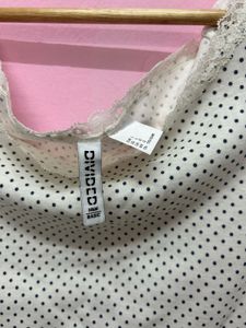 white polka dot off shoulder top