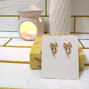 Bow Drop Earrings - Gold Tone