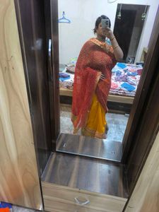 Yellow And Red Rajasthani Tie-dye Saree.