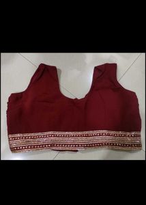 Elegant Maroon Embroidered Saree