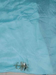 Cinon Fabric Cyan Colour Saree Without Blouse
