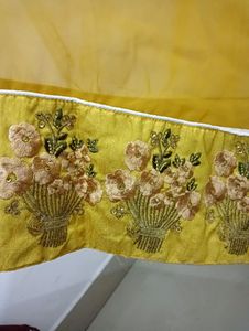 Embroidered yellow anarkali kurta with embroidered cream jacket