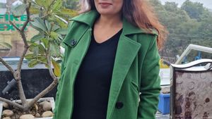 Green woollen overcoat