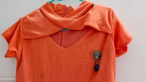 Uniquely Designed Orange Up-down Cut Dress!