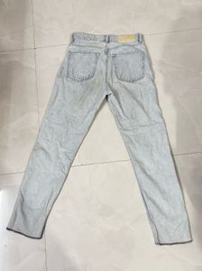 Distressed Light Wash Denim Jeans