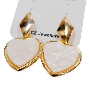 Radiant Gold-Pearl Plated Heart Earrings