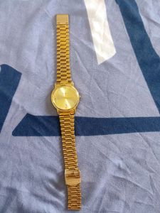 Men Watch With Golden Band.