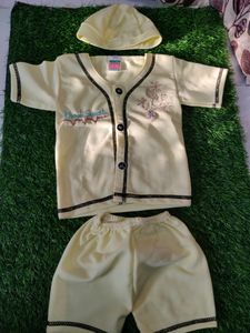 Cream Baby Set With Tshirt Shorts And Cap