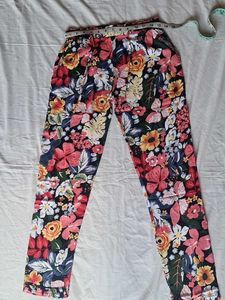 Straight Pant Floral Print On Black Base.