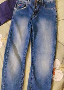 It's Is A Dark Blue Denim Jeans