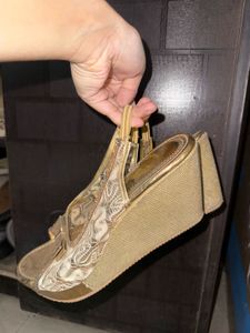 Golden Ethnic Heeled Wedges