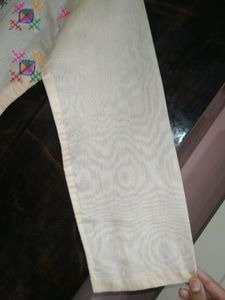 Lovely White Colour Kurti With Beautiful Embroidery Design On It