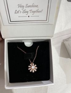 Rose Gold Flower Pendant