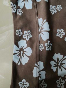 A beautiful brown miniskirt skirt with blue floral