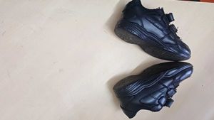 Lightly used Black Shoes for a Kid