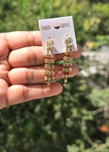 2 Pairs Of AD Earrings