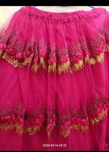 Golden choli and pink ghaghra with dupatta