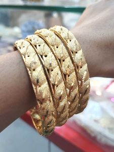 gold plated bangles (4pcs)
