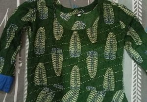 Green leaf-patterned dress