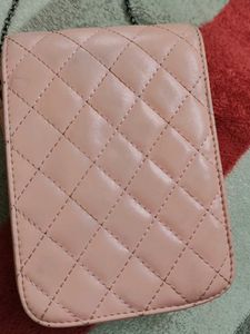 lino Perros pink sling bag