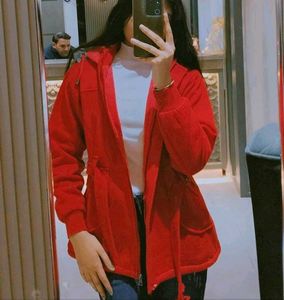 A Red Blazer With 3 Pockets & belt On Waist