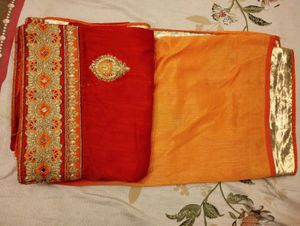 Elegant Red Saree with Gold Embroidery