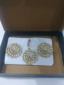 Golden Earrings And Mangtika Set.
