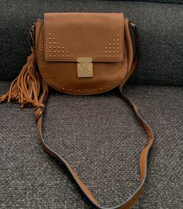 Faux leather saddle bag with stud