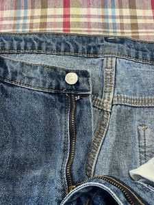 Ripped Knee Jeans - Size 6