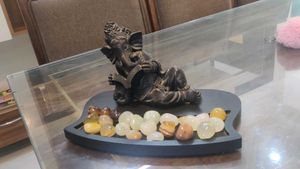 Elegant Lord Ganesha Reading Idol with Decorative