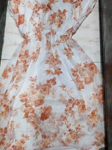 It&#39;s a frock orange White Colour