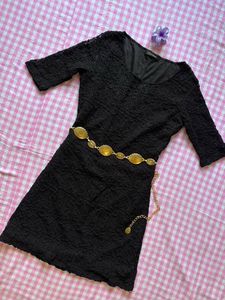 Embroidered black dress